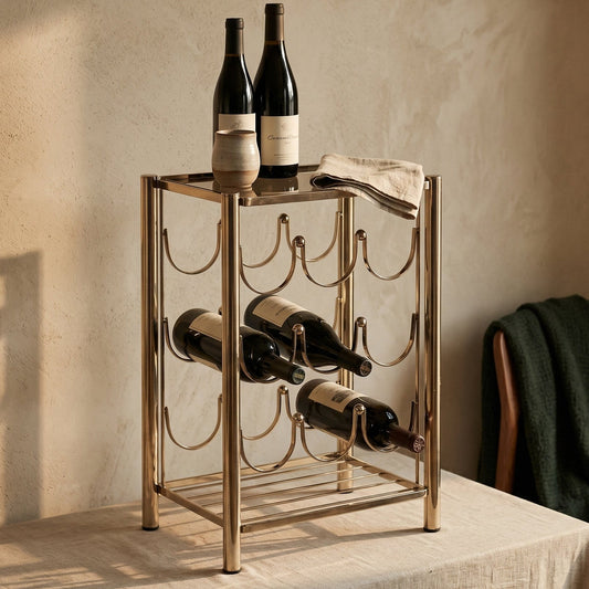 Wine rack with bottles on a table against a beige wall
